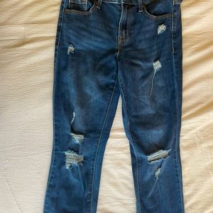 Hey y’all this is a pair of my kids old denim jeans they are ripped and mid rise